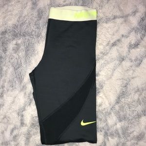 greenish nike pro leggings with neon green band